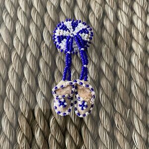 Hand beaded moccasins pin. Artisan and vintage.